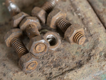 High angle view of rusty nut bolts