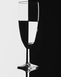 Close-up of lamp over black background