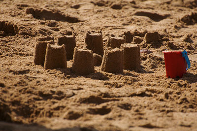 Close-up of text on sand at beach