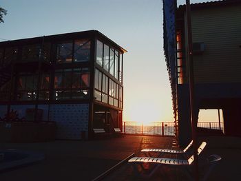 Low angle view of building against sky at sunset