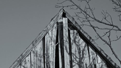 Low angle view of abandoned building against clear sky