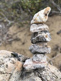 Close-up of stone stack on rock