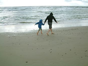 People enjoying at beach