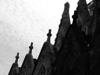 Low angle view of statue against sky