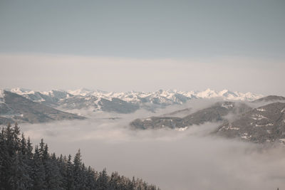 Scenic view of snowcapped mountains against sky