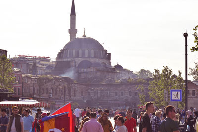 Group of people in front of historical building