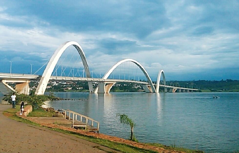 water, architecture, built structure, bridge - man made structure, sky, connection, cloud - sky, river, transportation, arch, arch bridge, bridge, engineering, cloud, cloudy, tree, outdoors, waterfront, no people, railing