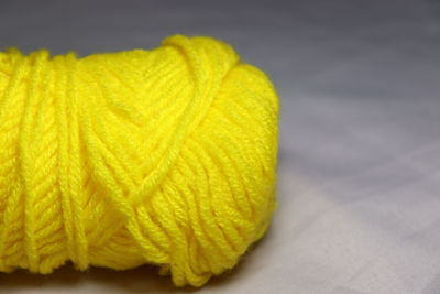 Close-up of yellow leaf on table