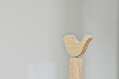 Close-up of heart shape on white wall