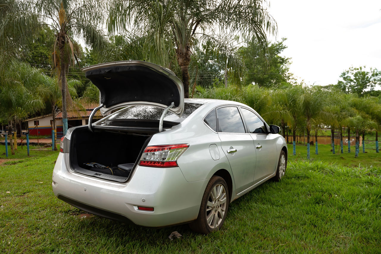 VIEW OF CAR ON FIELD