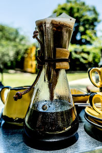 Close-up of old machine on table