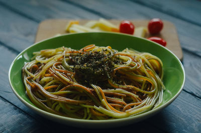 Close-up of noodles in bowl on table