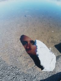 High angle portrait of man on beach