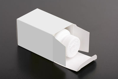 High angle view of white paper on table