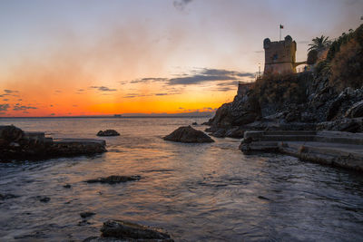 Scenic view of sea against sky during sunset