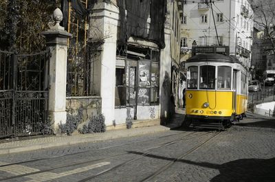 Yellow bus on street in city