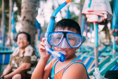 Portrait of boy wearing swimming goggles