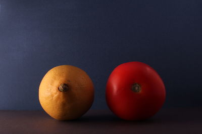 Close-up of orange fruits on table