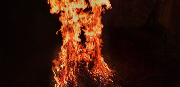 View of fire in dark outdoors