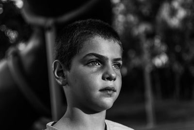 Portrait of serious boy looking away