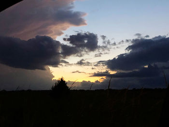 Scenic view of silhouette landscape against sky during sunset