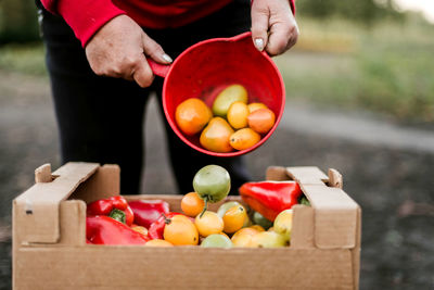 Midsection of man preparing food