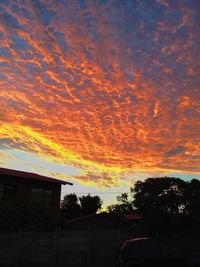 Low angle view of cloudy sky at sunset