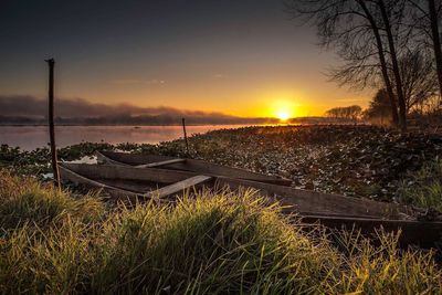 Scenic view of landscape against sky during sunset