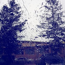 Close-up of water drops on glass window