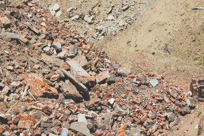 High angle view of damaged bricks at construction site