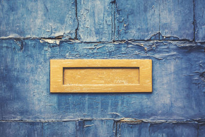 Full frame shot of blue weathered door