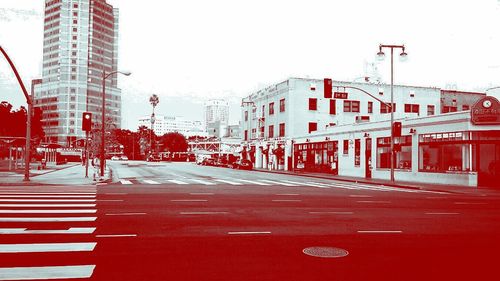 Road along buildings in city