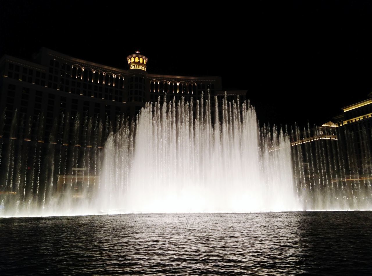 water, waterfront, motion, long exposure, architecture, built structure, fountain, night, splashing, building exterior, spraying, illuminated, waterfall, flowing water, famous place, reflection, sky, travel destinations, city, blurred motion