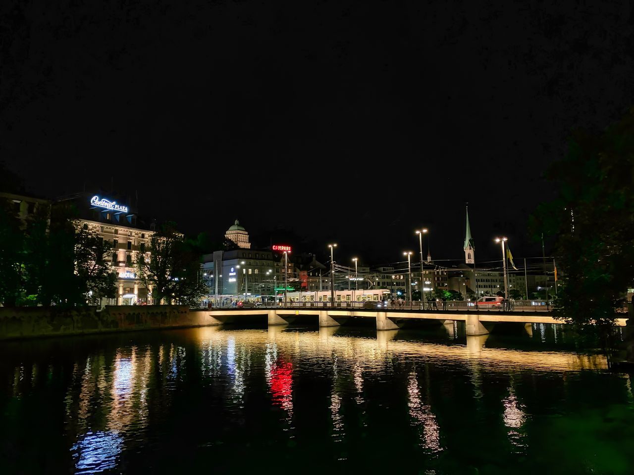 reflection, night, water, architecture, built structure, illuminated, building exterior, evening, dusk, darkness, river, light, city, no people, travel destinations, nature, cityscape, transportation, waterfront, building, sky, outdoors, bridge, nautical vessel, travel