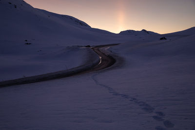 Scenic view of snow covered landscape