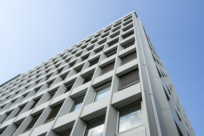 Low angle view of modern building against clear sky