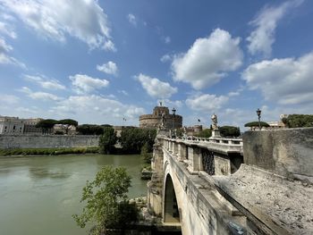 Bridge over river against sky