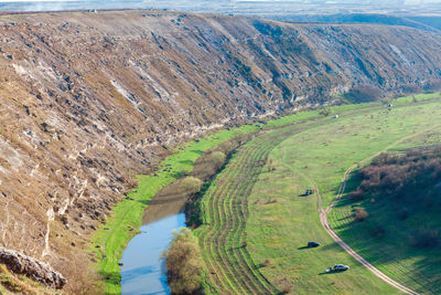 Green meadows surrounded by hills . famous place in moldova orheiul vechi nature