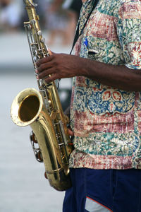 Person holding trumpet