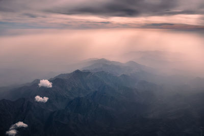 Scenic view of mountains against sky during sunset