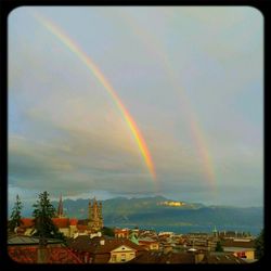 Rainbow over city