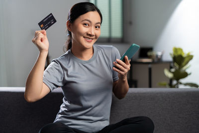 Woman using mobile phone