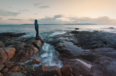 Beautiful sunset seascape scenery of rocky coast at wild atlantic way in galway, ireland