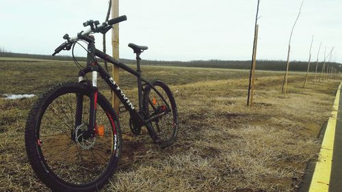 Bicycle wheel against sky