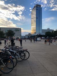 Bicycles against sky in city