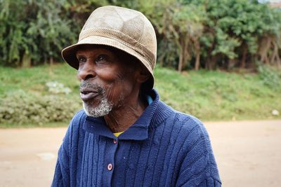 Portrait of man wearing hat outdoors