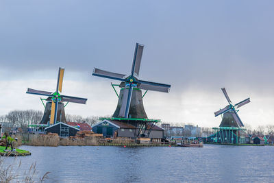 Traditional windmill against sky