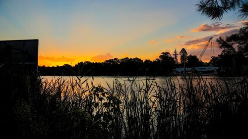 Scenic view of lake during sunset