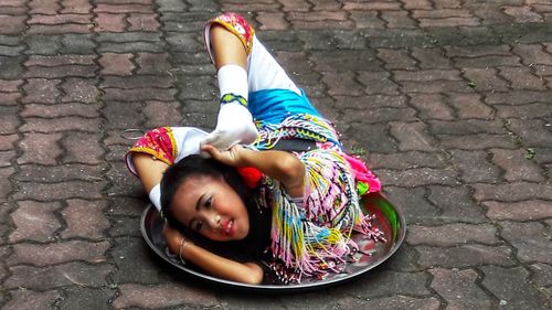 High angle view of smiling girl wearing hat