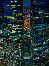 Aerial view of illuminated cityscape at night